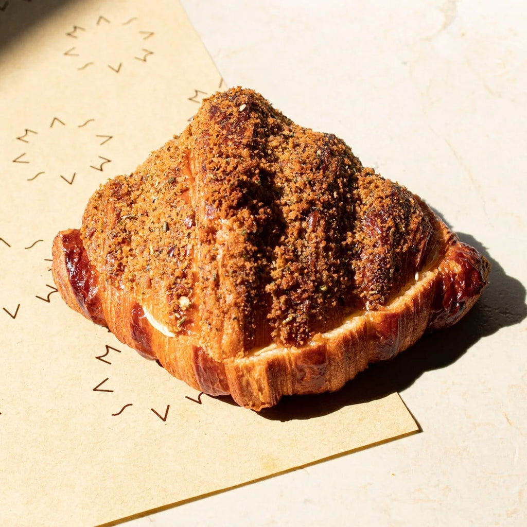 Savory Delights: Confit Garlic & Cheese Croissant!